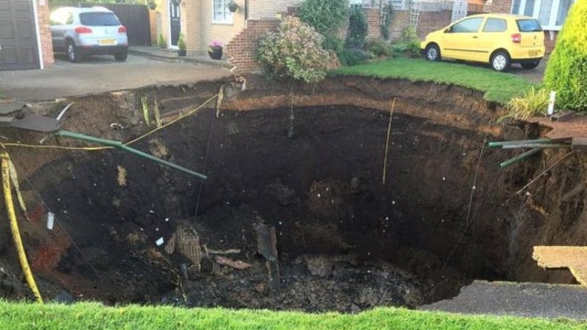 Massive Sinkhole Forces Residents From Their Homes In London