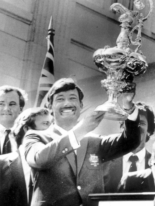 Australia I skipper, John Bertrand with America's Cup trophy.