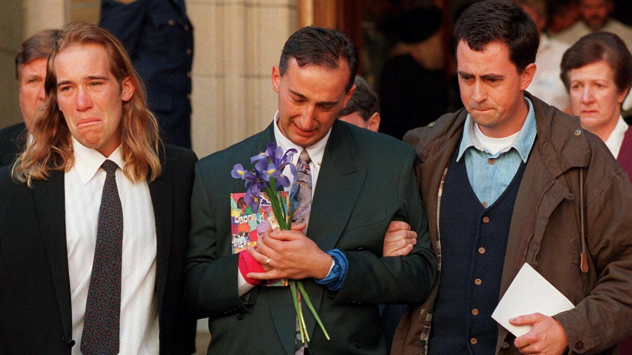 Walter Mikac (centre) aged just 34 grieves outside St David’s Cathedral in Hobart after a memorial for his family and other victims of the Port Arthur massacre.