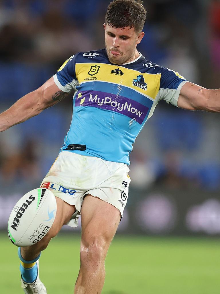 Toby Sexton of the Titans kicks during the round 8 NRL match between the Titans and the Panthers at Cbus Super Stadium, on April 29, 2022, in Gold Coast, Australia. (Photo by Chris Hyde/Getty Images)