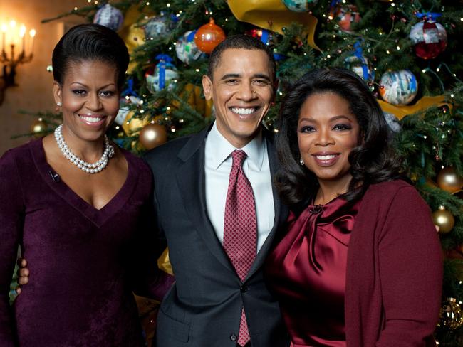 Former US President Barack Obama and former First Lady Michelle Obama pose with TV personality Oprah Winfrey in the Blue Room of the White House in 200-9. Pixture: AP