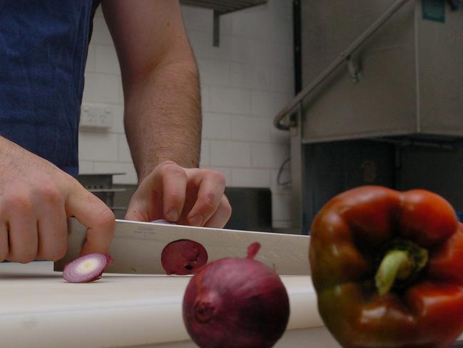 Cooking Head Chef  readies some veggies. Generic (TO BE USED ONLY FOR EDITORIAL)