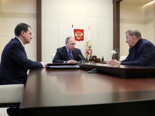 Russian President Vladimir Putin (centre) attends a meeting with Russian Culture Minister Vladimir Medinsky (left) and Russian Director General of the State Bolshoi Theatre Vladimir Urin. Picture: AFP/ Sputnik/Michael Klimentyev