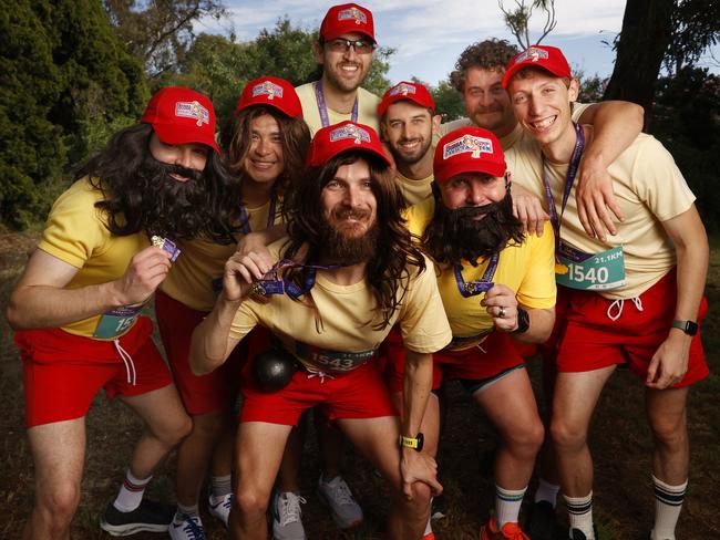 Cory Stone centre with some of his crew on his bucks weekend from Adelaide who all ran dressed as Forrest Gump.  2025 Cadbury Marathon.  Picture: Nikki Davis-Jones