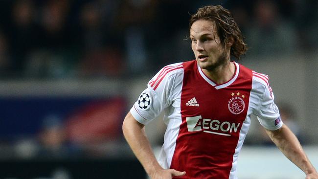 (FILES) In a file picture taken on October 3, 2012 Ajax Amsterdam's defender Daley Blind controls the ball during the UEFA Champions League Group D football match Ajax Amsterdam vs Real Madrid at the Arena stadium in Amsterdam. Manchester United are set to sign Dutch international Daley Blind after agreeing a fee with his current side Ajax, Manchester United announced on August 30, 2014. The 24-year-old Blind was in Manchester United coach Louis van Gaal's World Cup squad in Brazil and can play at left-back and as a defensive midfielder. AFP PHOTO / FRANCK FIFE