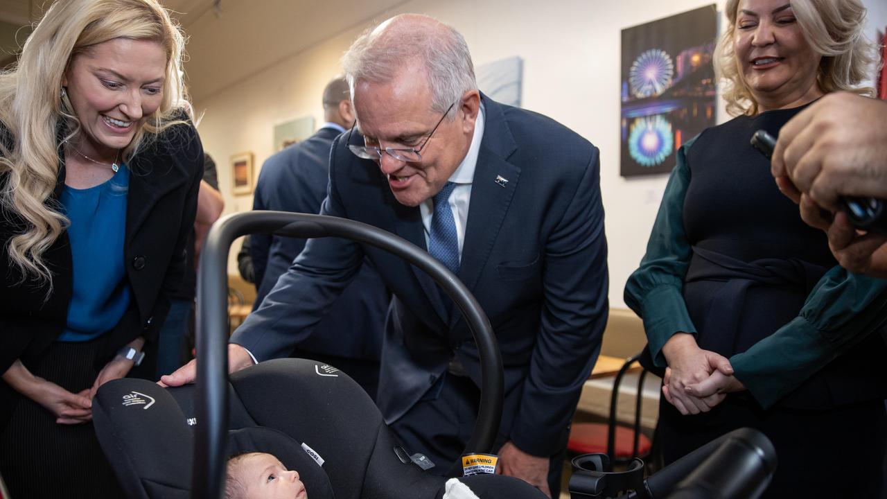 Scott Morrison visits a cafe in Glenelg with Liberal candidate for Boothby Rachel Swift and Mayor Amanda Wilson. Picture: Jason Edwards