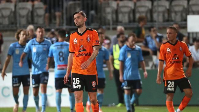 The Roar’s Jay O’Shea reacts after Brisbane concede another goal in their 5-1 loss to Sydney FC (AAP Image/Jeremy Ng)