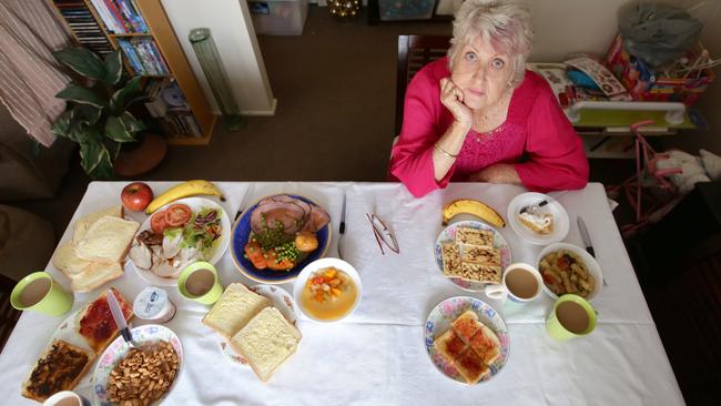 Pensioner Faye Trewick, 70, from Woodridge, compares her daily food allowance (right) to that of a prisoner’s (left).