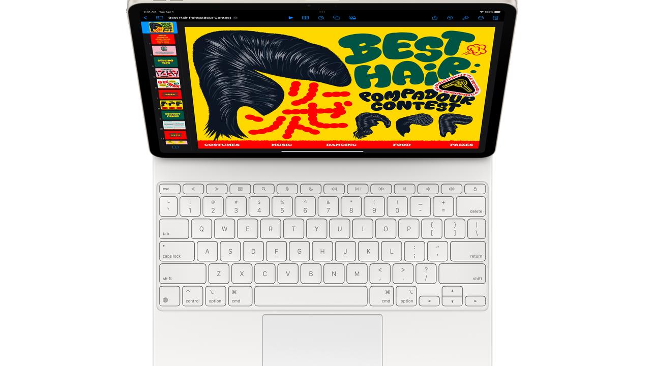 The new Apple Magic Keyboard features a larger trackpad and function bar.