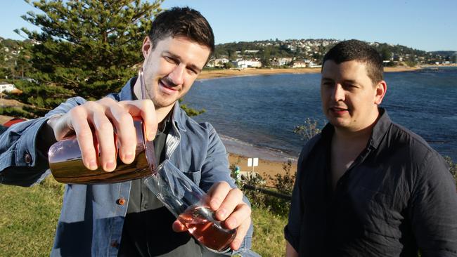 The Collaroy mixologist Kurtis Bosley and head chef Ben Varela with their cocktail.