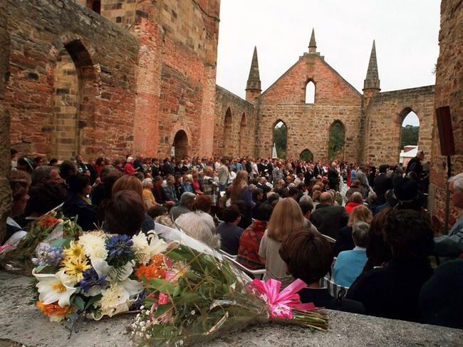 April 28, 1997: Mourners gather for a private service inside Port Arthur church on the first anniversary of the shooting massacre.