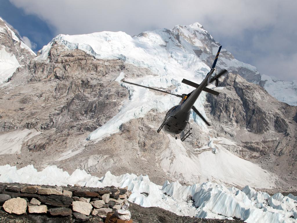 A rescue helicopter hovers over Everest base camp. Picture: iStock