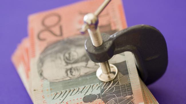 Australian dollars In Vice. Pic supplied by Thinkstock.