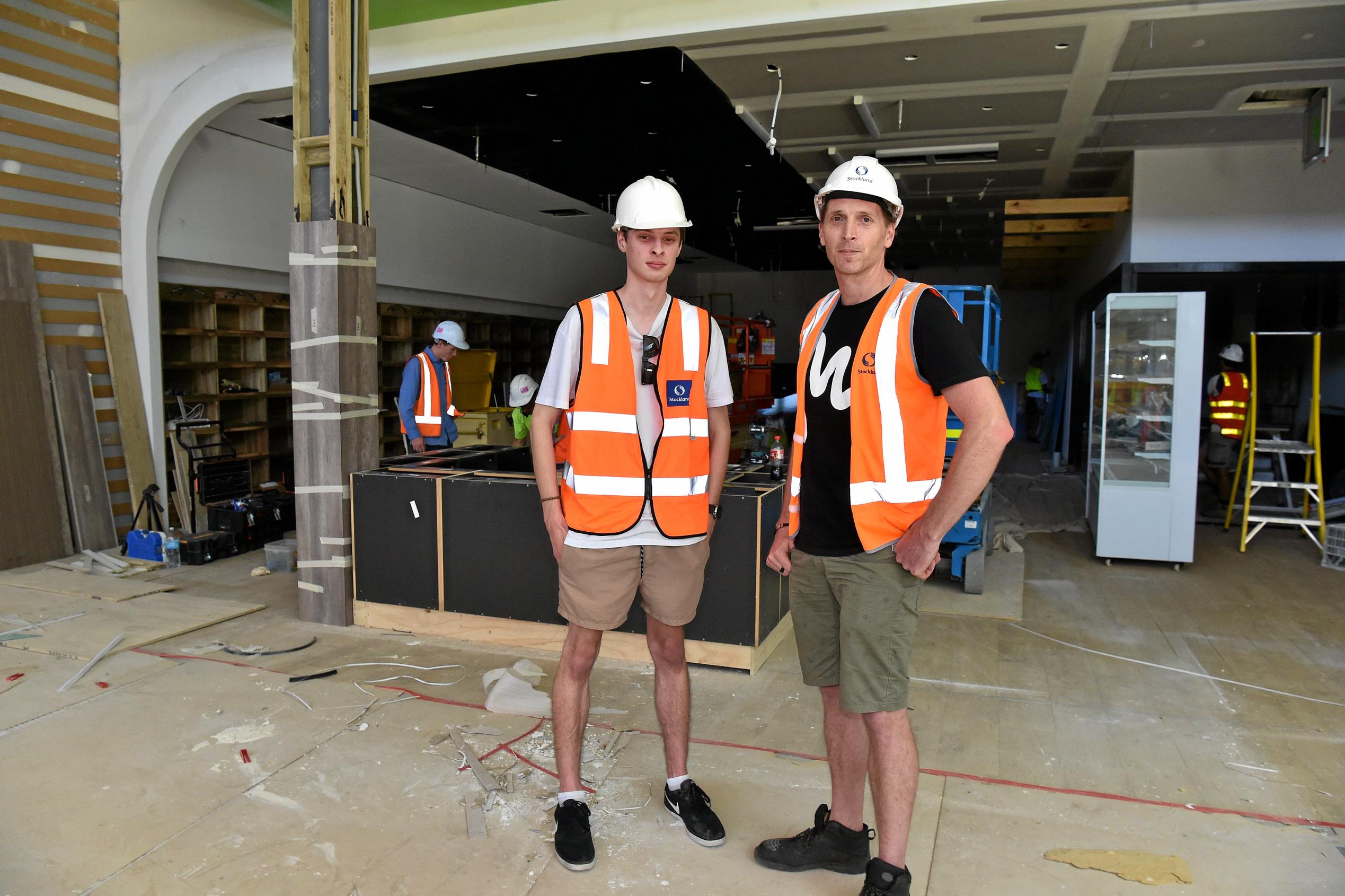 Full steam ahead for the opening of the Stockland Birtinya Shopping Centre. Constuction workers put the final pieces together for the grand opening in a couple of weeks.Luke O'Donnell and Damain Van Roe Van opening a fruit and vegetable store. Picture: Warren Lynam