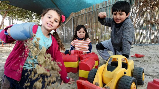 Jindi Woraback Children's Centre was one of eight Victorian centres rated “excellent”. Elianna, Olivia and Razin. Picture: Tony Gough