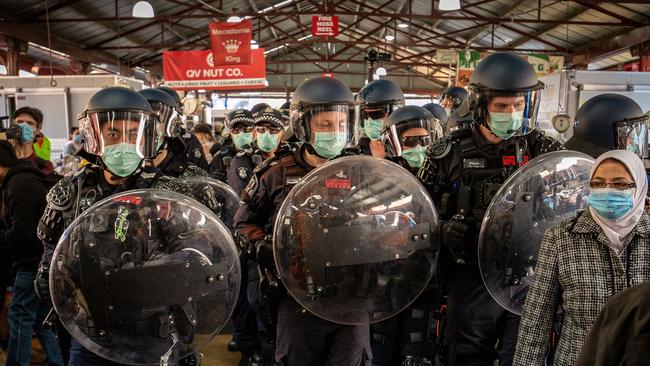 A heavy police presence at the Queen Victoria Market in Melbourne on Sunday. Picture: Getty Images.