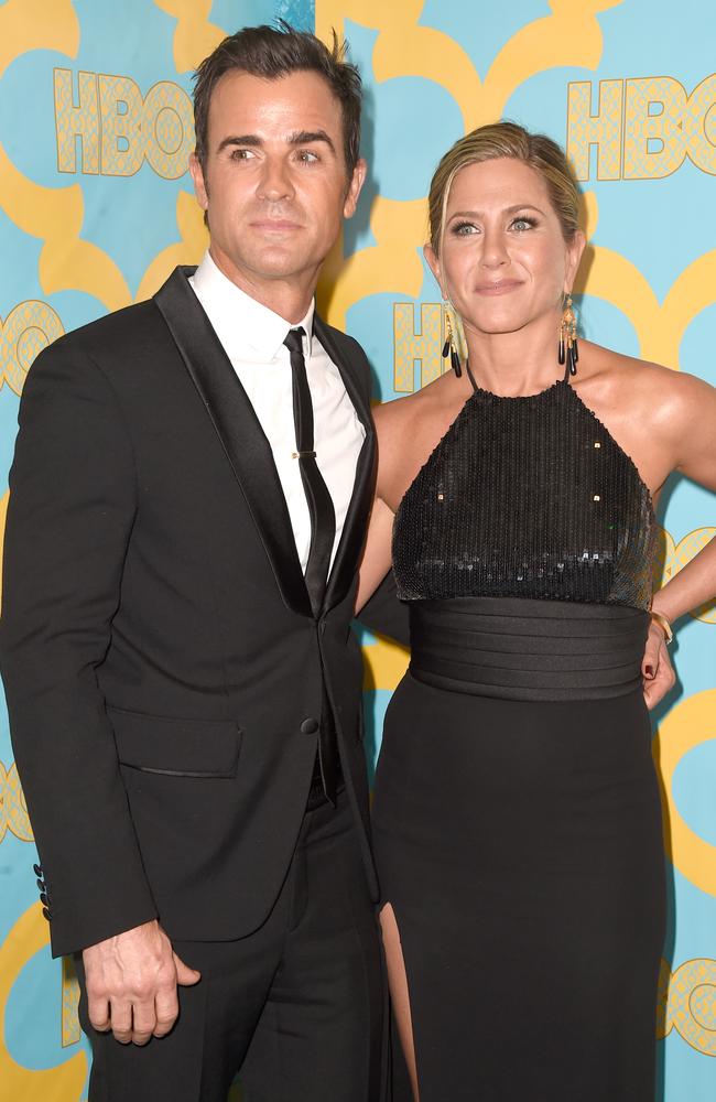 Engaged ... Justin Theroux and Jen look serious at HBO's Golden Globes after party.