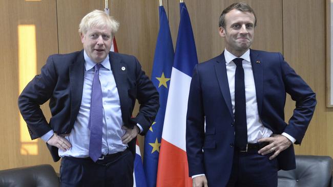 Britain's Prime Minister Boris Johnson with French President Emmanuel Macron in Brussels. Picture: AP.