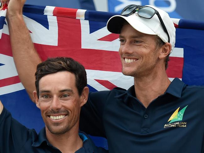 FUJISAWA, JAPAN - AUGUST 22: Gold medalists Mathew Belcher and Will Ryan of Australia celebrate during the medal presentation of the Men's 470 class on day 6 of the Sailing Tokyo 2020 test event at Enoshima Yacht Harbour on August 22, 2019 in Fujisawa, Kanagawa, Japan. (Photo by Matt Roberts/Getty Images)