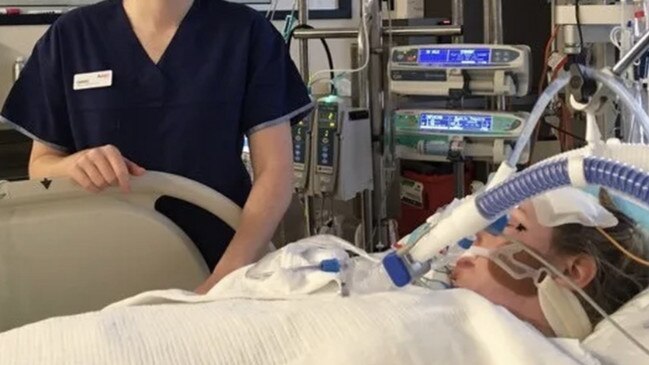 Nicole was in a coma for two weeks before waking up, attached to a breathing tube. Picture: Supplied