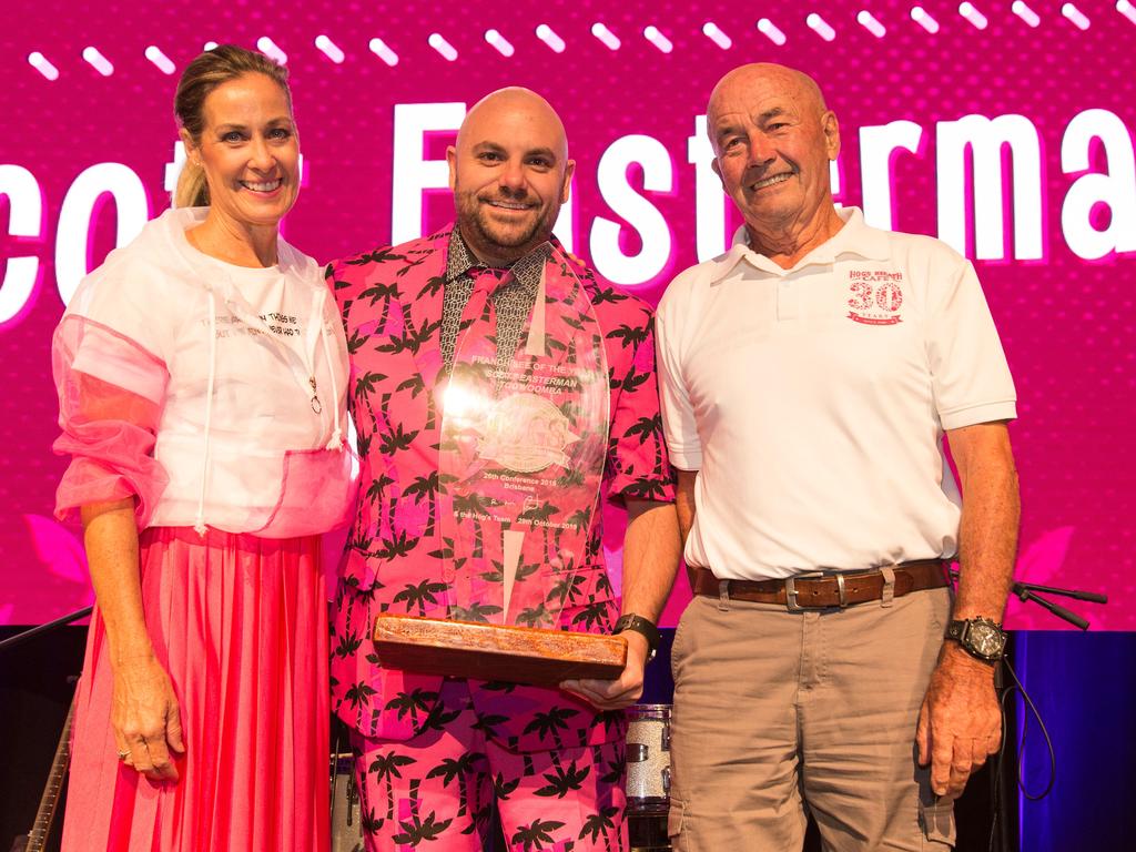 Hog's Breath Founder Don Algie and his partner Ginger White, with Toowoomba franchisee Scott Easterman (centre). Mr Algie and Ms White bought back the franchise arm of the business.