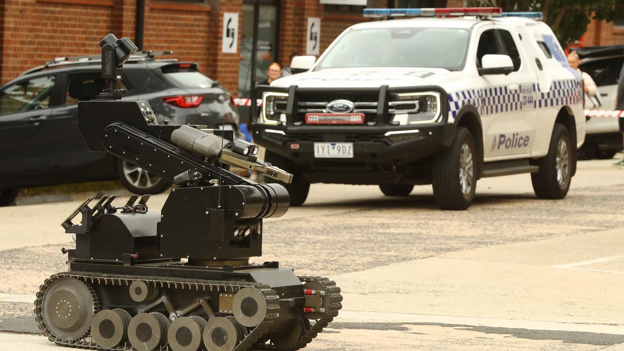 The bomb squad at work at AMDA after a suspicious package was delivered. Picture: Alison Wynd.