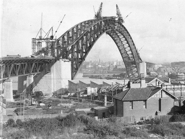 A view from North Sydney of the Sydney Harbour Bridge under construction in 1930. Picture State Library of NSW