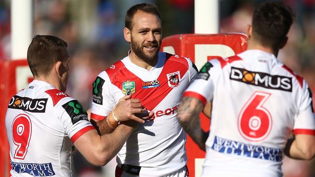 SYDNEY, AUSTRALIA — JUNE 25: Jason Nightingale of the Dragons celebrates scoring a try with team mates during the round 16 NRL match between the St George Illawarra Dragons and the Newcastle Knights at UOW Jubilee Oval on June 25, 2017 in Sydney, Australia. (Photo by Mark Metcalfe/Getty Images)