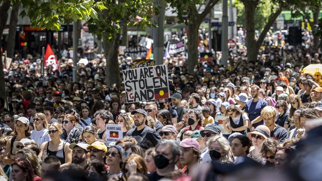 Thousands listen to speeches in Melbourne's CBD. Picture: Jake Nowakowski