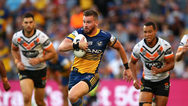 SYDNEY, AUSTRALIA - APRIL 22: Clint Gutherson of the Eels makes a break during the round 6 NRL match between the Parramatta Eels and Wests Tigers at Bankwest Stadium on April 22, 2019 in Sydney, Australia. (Photo by Matt Blyth/Getty Images)