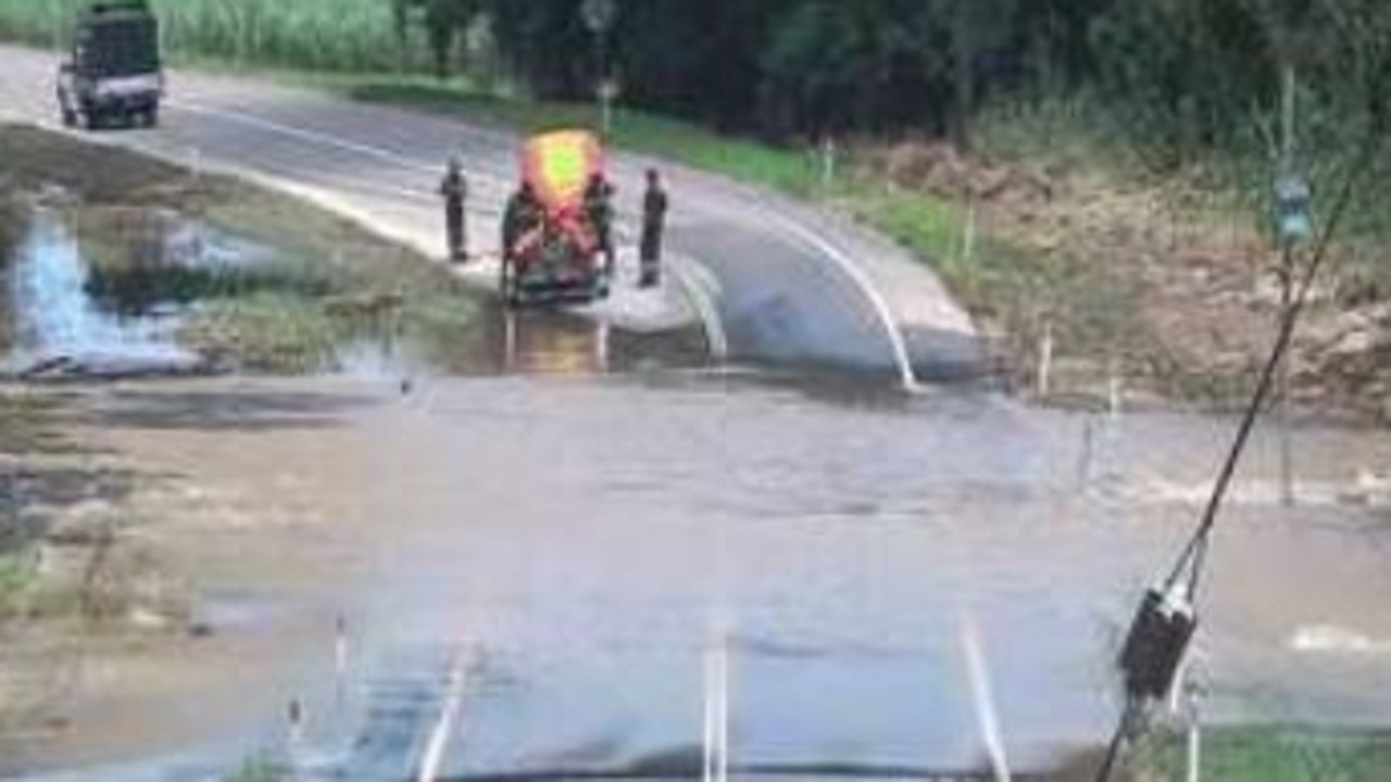 Police and emergency services were assessing waters level across the Gairloch washaway as of 11:30am on Friday preparing for the reopening of the Bruce Highway between Cardwell and Ingham. Photo: Flood watch