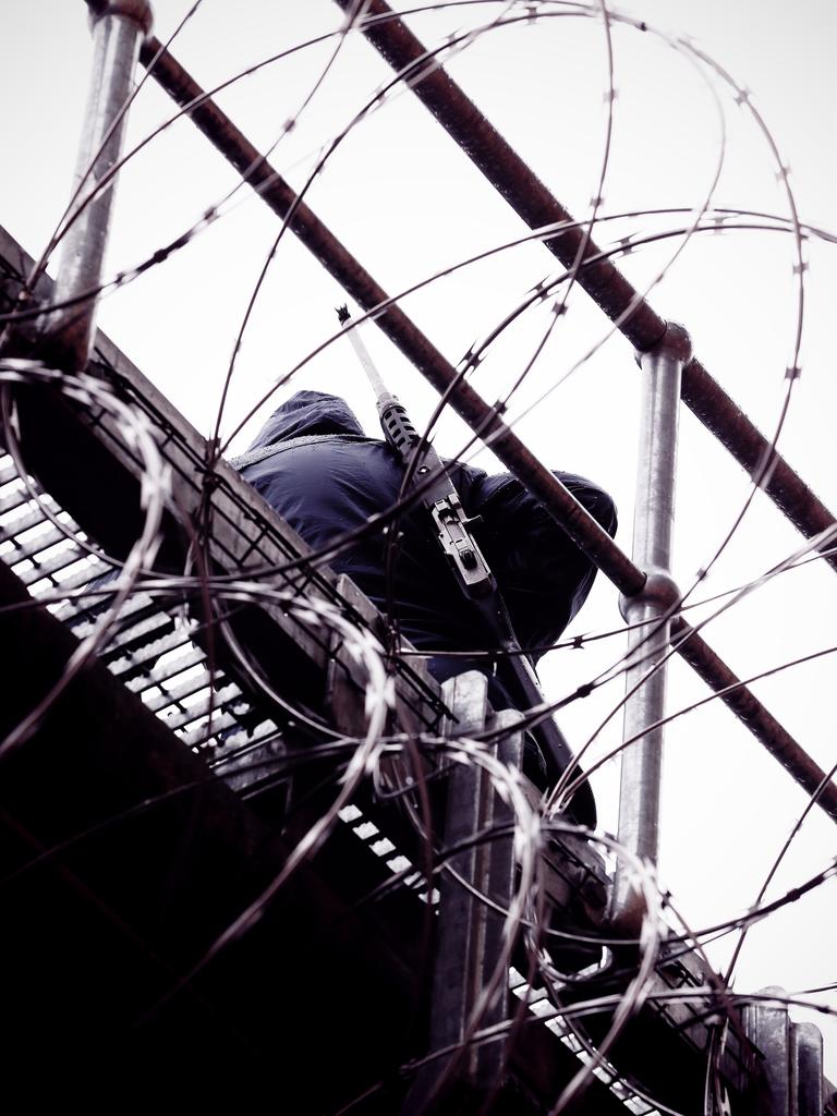 Prison officer on catwalk above Goulburn jail. Picture: Sam Ruttyn