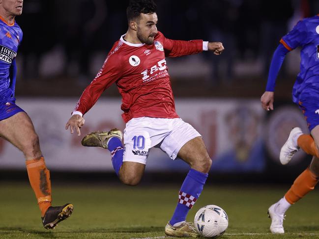 MELBOURNE, AUSTRALIA - AUGUST 10: Gian Albano of the Knights kicks a goal during the round of 32 2023 Australia Cup match between Melbourne Knights FC and Lions FC at Knights Stadium, on August 10, 2023 in Melbourne, Australia. (Photo by Daniel Pockett/Getty Images)