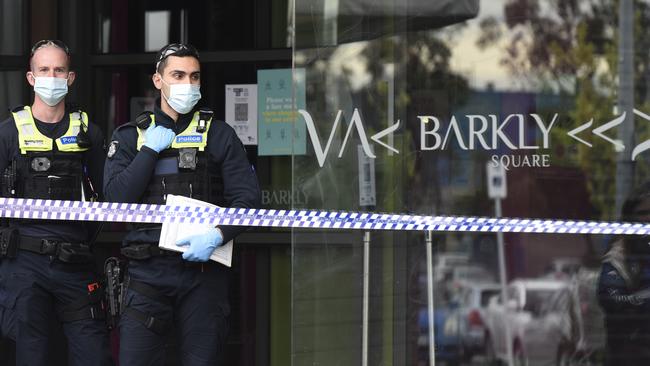 Police at the scene of a double stabbing at Barkly Square shopping centre in Brunswick. Picture: Andrew Henshaw