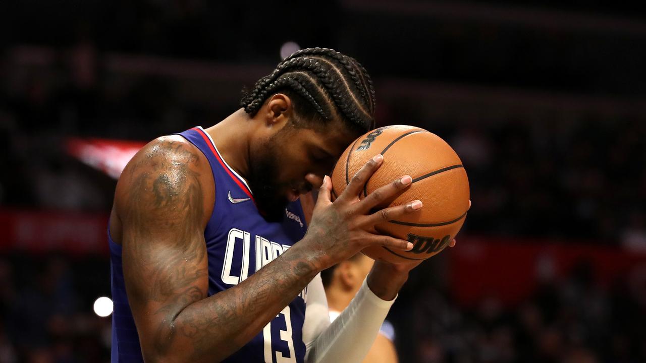 LOS ANGELES, CALIFORNIA - NOVEMBER 01: Paul George #13 of the Los Angeles Clippers reacts after a play during the fourth quarter against the Oklahoma City Thunder at Staples Center on November 01, 2021 in Los Angeles, California. NOTE TO USER: User expressly acknowledges and agrees that, by downloading and/or using this Photograph, user is consenting to the terms and conditions of the Getty Images License Agreement. (Photo by Katelyn Mulcahy/Getty Images)