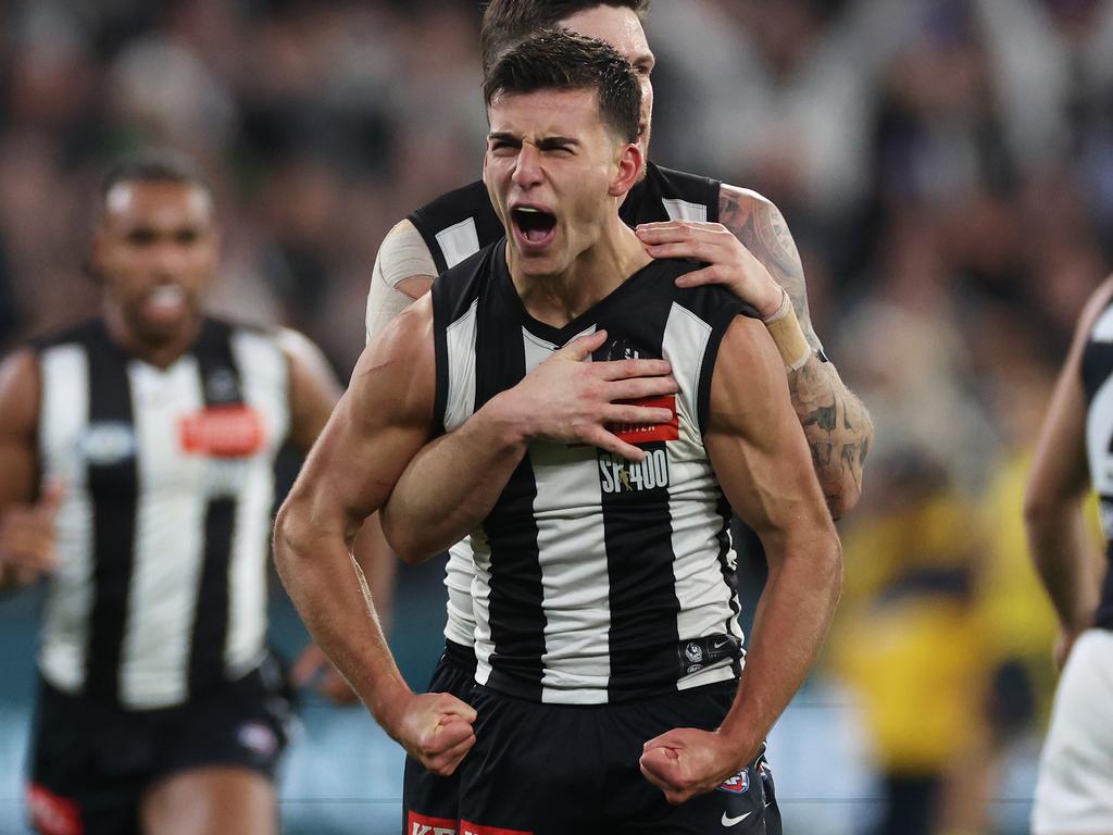 MELBOURNE, AUSTRALIA - AUGUST 03: Nick Daicos of the Magpies celebrates kicking a goal during the round 21 AFL match between Collingwood Magpies and Carlton Blues at Melbourne Cricket Ground, on August 03, 2024, in Melbourne, Australia. (Photo by Daniel Pockett/Getty Images)