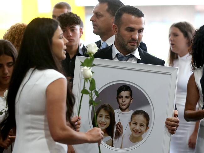 The Abdallah Family at a Mass at Our Lady of Lebanon church, Harris Park . 29th January 2021. Picture by Damian Shaw