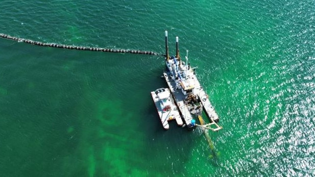 Sand Dredging off the coast of West Beach, which is being blamed for the unprecedented mortality. Picture: Department for Environment and Water