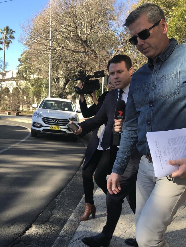 Former Surf Life Saving NSW boss Matthew Hanks leaves Wollongong police station on Wednesday. Picture: Madeline Crittenden