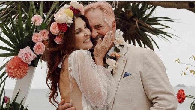 Boutique hotelier Terry Kaljo and Mike Logan at their Byron Bay wedding. Image: Supplied.