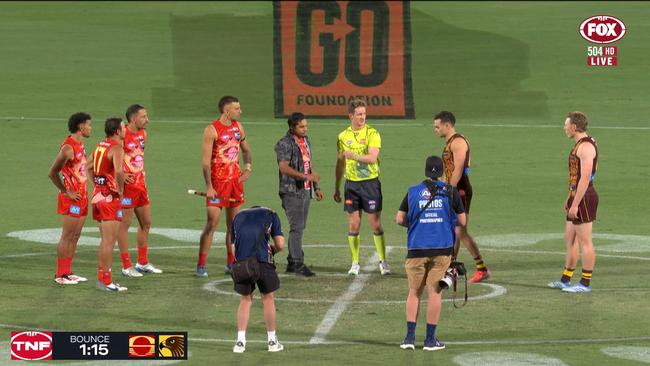 Gold Coast and Hawthorn players exchange gifts before the game. Photo: Fox Footy.