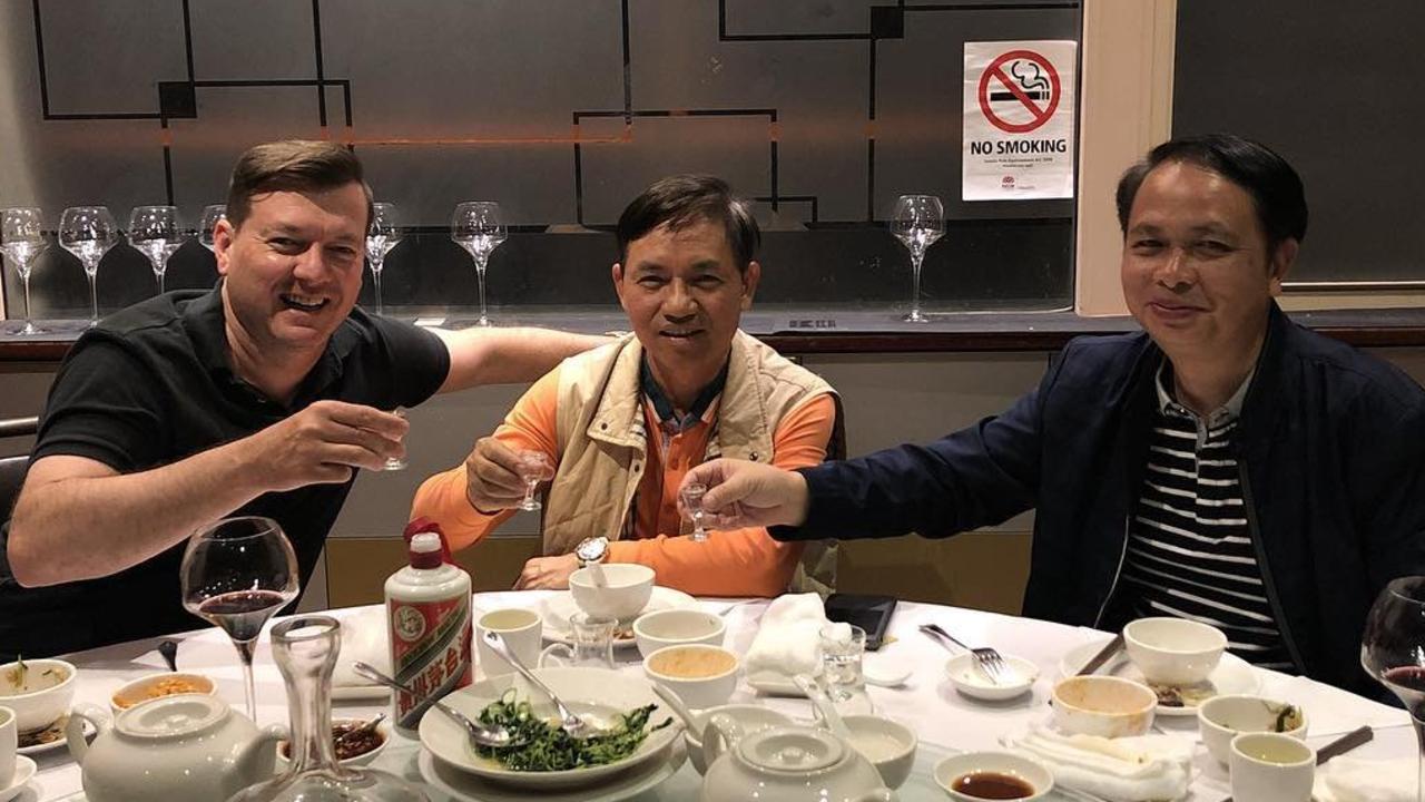 REMAX real estate agent Scott Mackey all smiles with developer Sheng Wei (centre) after the nine-storey Jewel application was given the green light in 2018 before being called in by Planning Minister Cameron Dick.