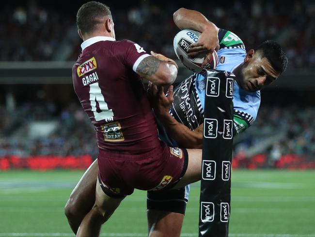 Try saving tackle by QLD's Dane Gagai on NSW's Daniel Tupou during Game 1 of the NSW v QLD State of Origin series at Adelaide Oval, Adelaide. Picture: Brett Costello