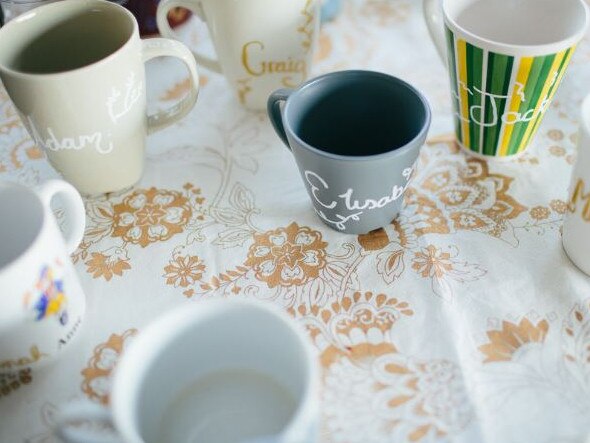 Guests toasted to Brooklyn and Nick on their own personalised second-hand mugs. Picture: Sandra Henri