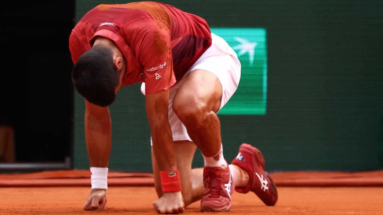 Serbia's Novak Djokovic reacts after falling on the court during his men's singles round of sixteen match against Argentina's Francisco Cerundolo on Court Philippe Chatrier. Picture: AFP