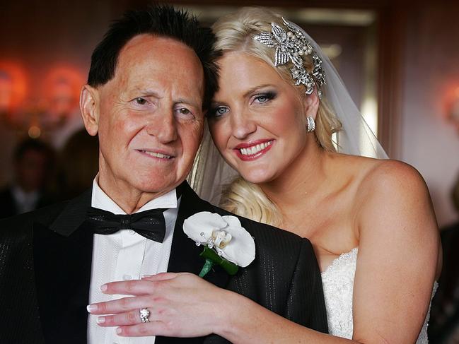 Geoffrey Edelsten and his new bride posed for photographers after the wedding in 2009. Picture: Great Expectations Foundation Ltd/Getty Images