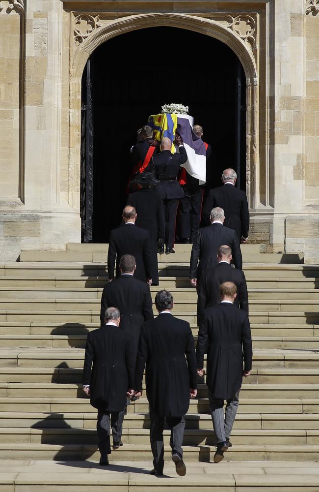 Princess Anne, Prince Charles, Prince Andrew, Prince Edward, Prince William,, Peter Phillips, Prince Harry, Earl of Snowdon David Armstrong-Jones and Vice-Admiral Sir Timothy Laurence follow Prince Philip’s coffin as it arrives at St George's Chapel. Picture: Kirsty Wigglesworth/WPA Pool/Getty Images