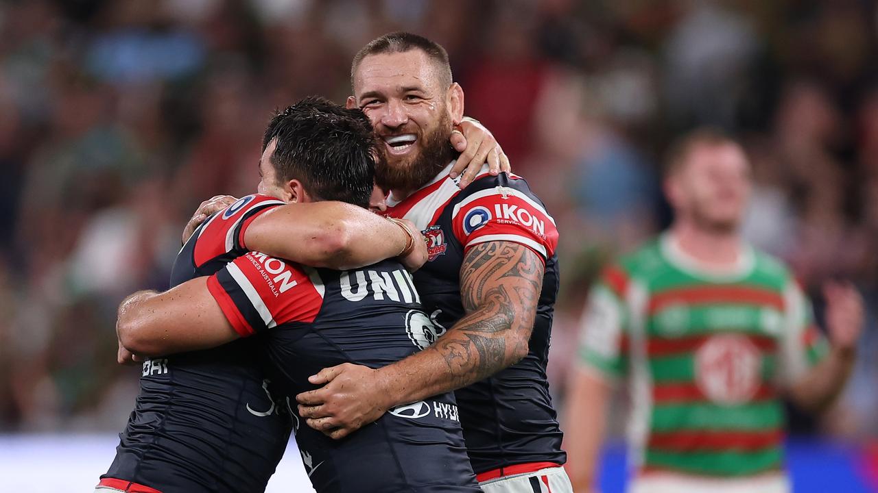 Victor Radley, Brandon Smith and Jared Waerea-Hargreaves celebrate a win.