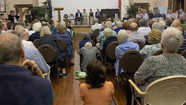 David Penberthy’s disembodied likeness can be seen on the stage at Adelaide Parklands Preservation Association debate at North Adelaide Community Centre last night.