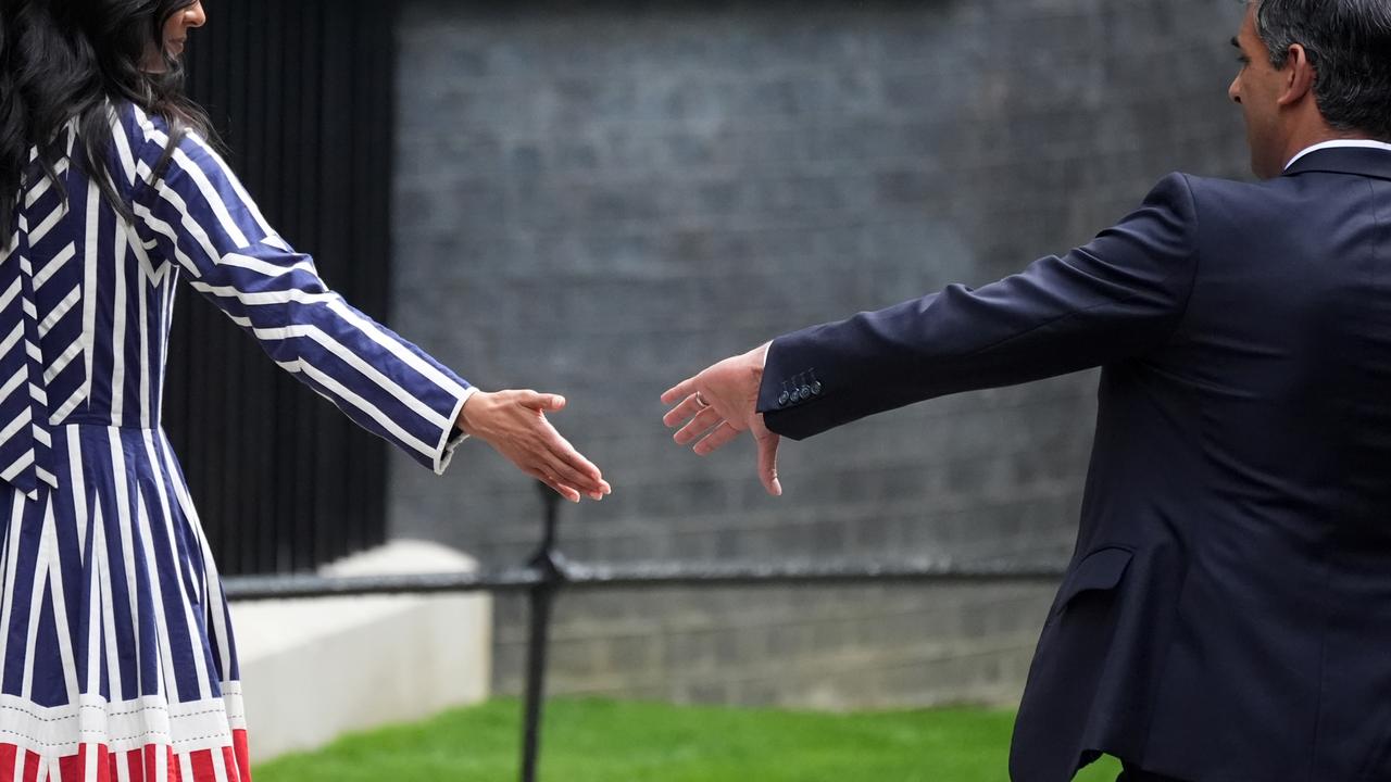 The outgoing prime ministerial couple as they leave No 10. Picture: Getty Images